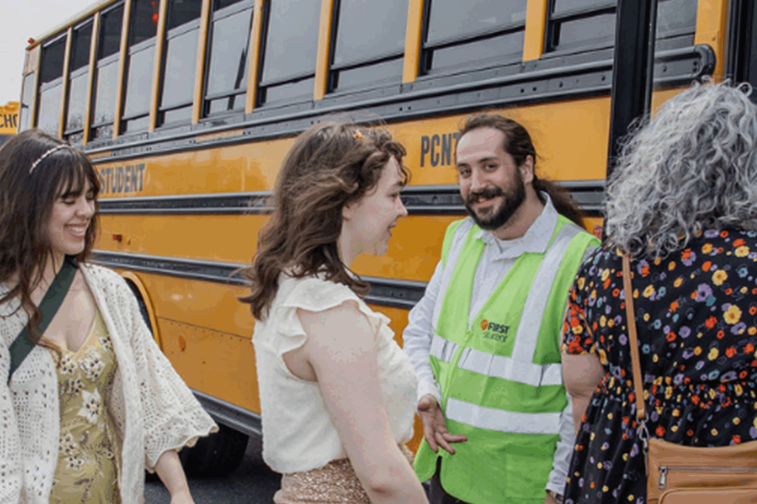 Passengers getting on a bus