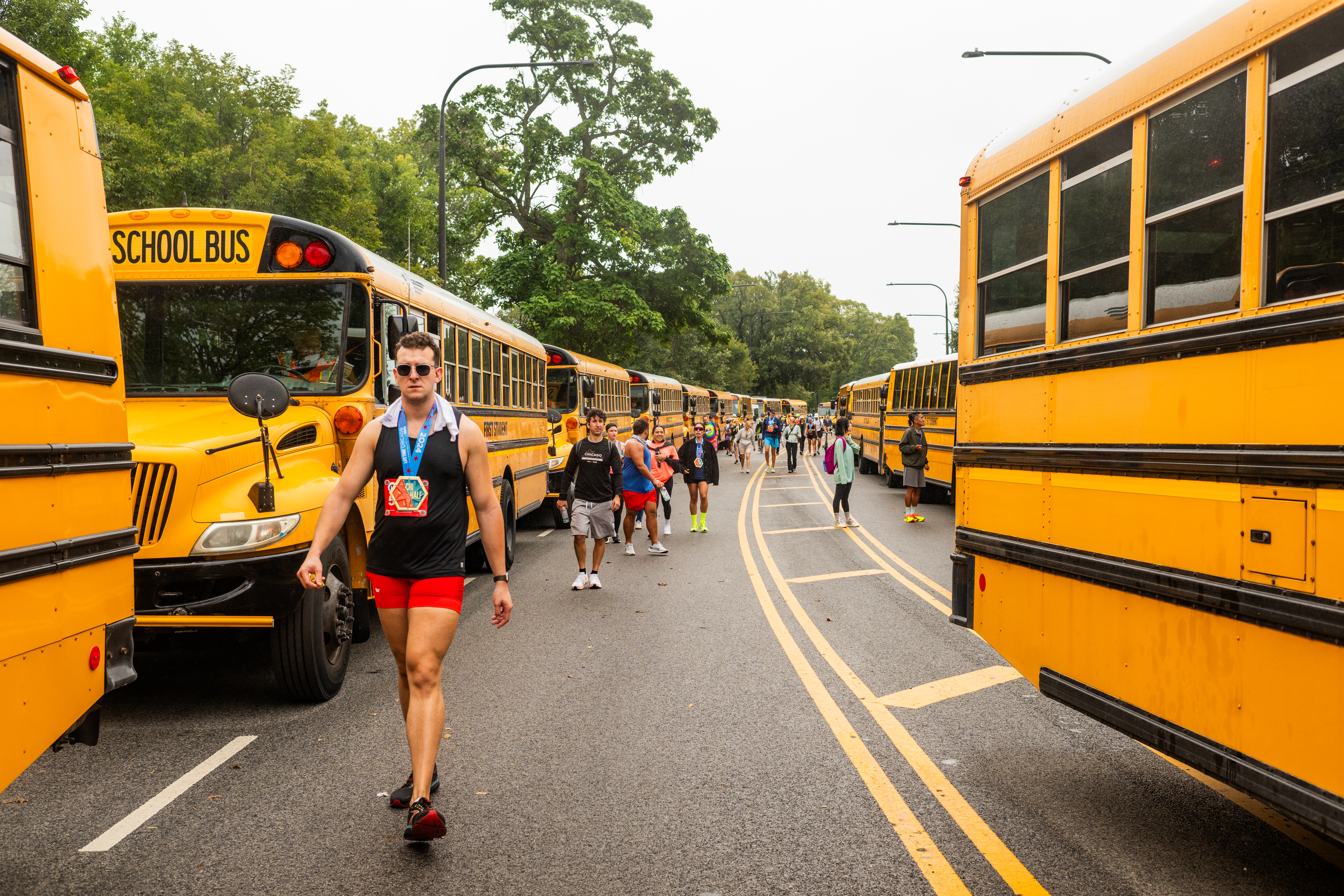 Chicago Marathon Runners using First Charter buses